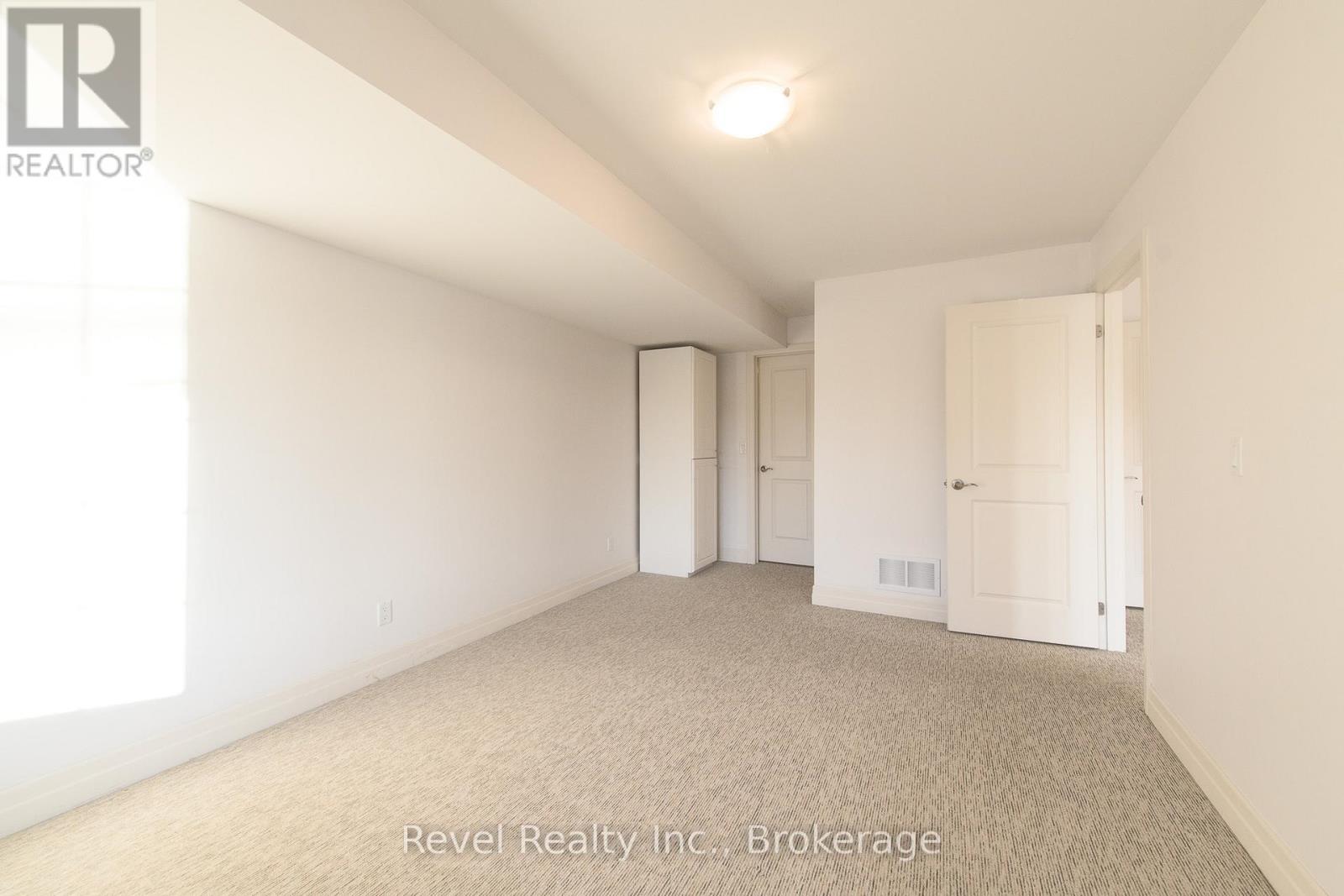 4 - 64 River Road E, Wasaga Beach, ON - Indoor Photo Showing Other Room