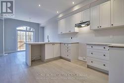 pots and pans drawers, stainless hood fan included -