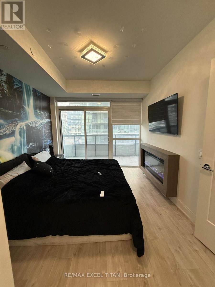 906 - 65 Annie Craig Drive, Toronto, ON - Indoor With Fireplace