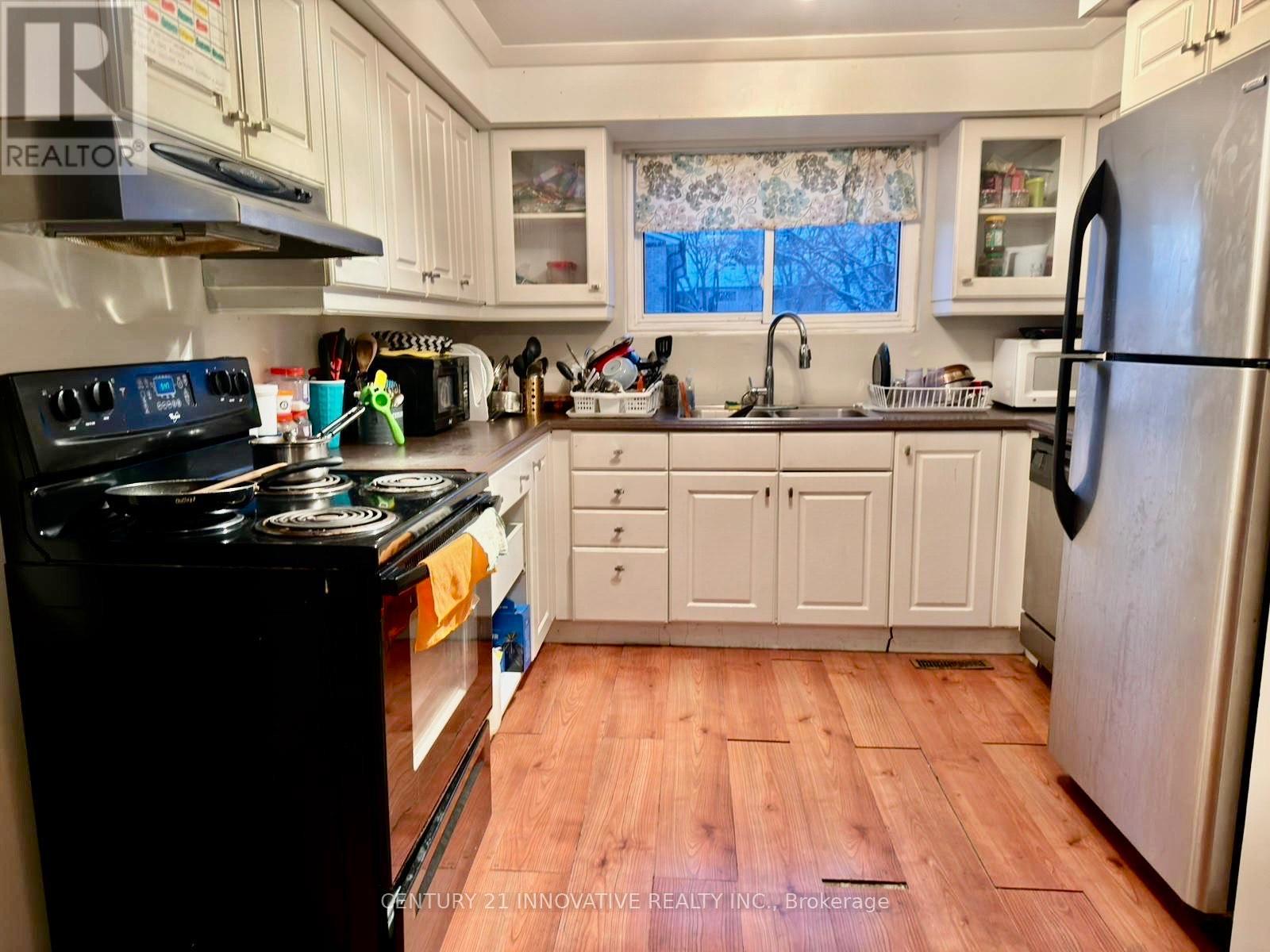 74 - 1330 Trowbridge Drive E, Oshawa, ON - Indoor Photo Showing Kitchen With Double Sink