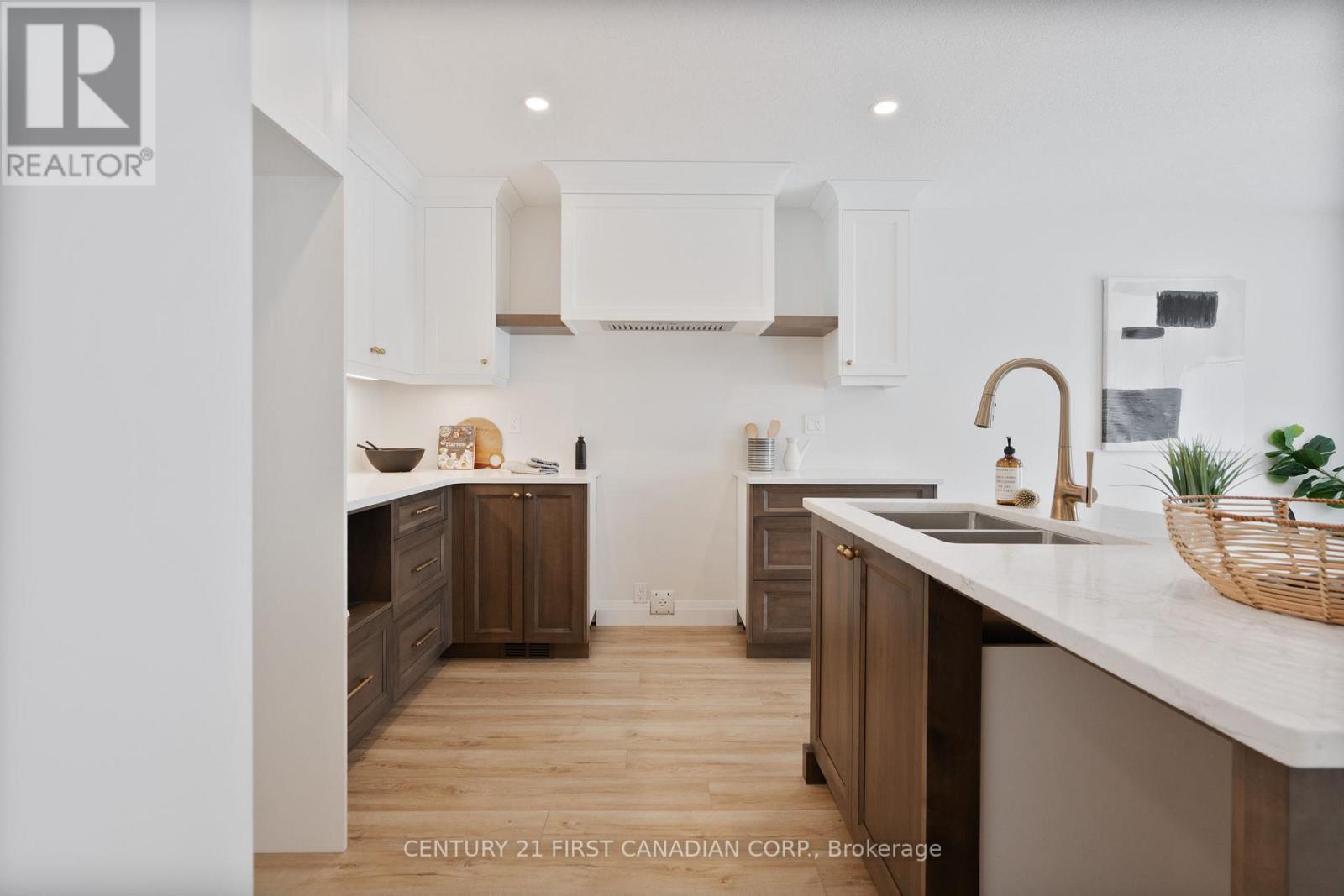 64 Postma Crescent, North Middlesex (Ailsa Craig), ON - Indoor Photo Showing Kitchen With Double Sink