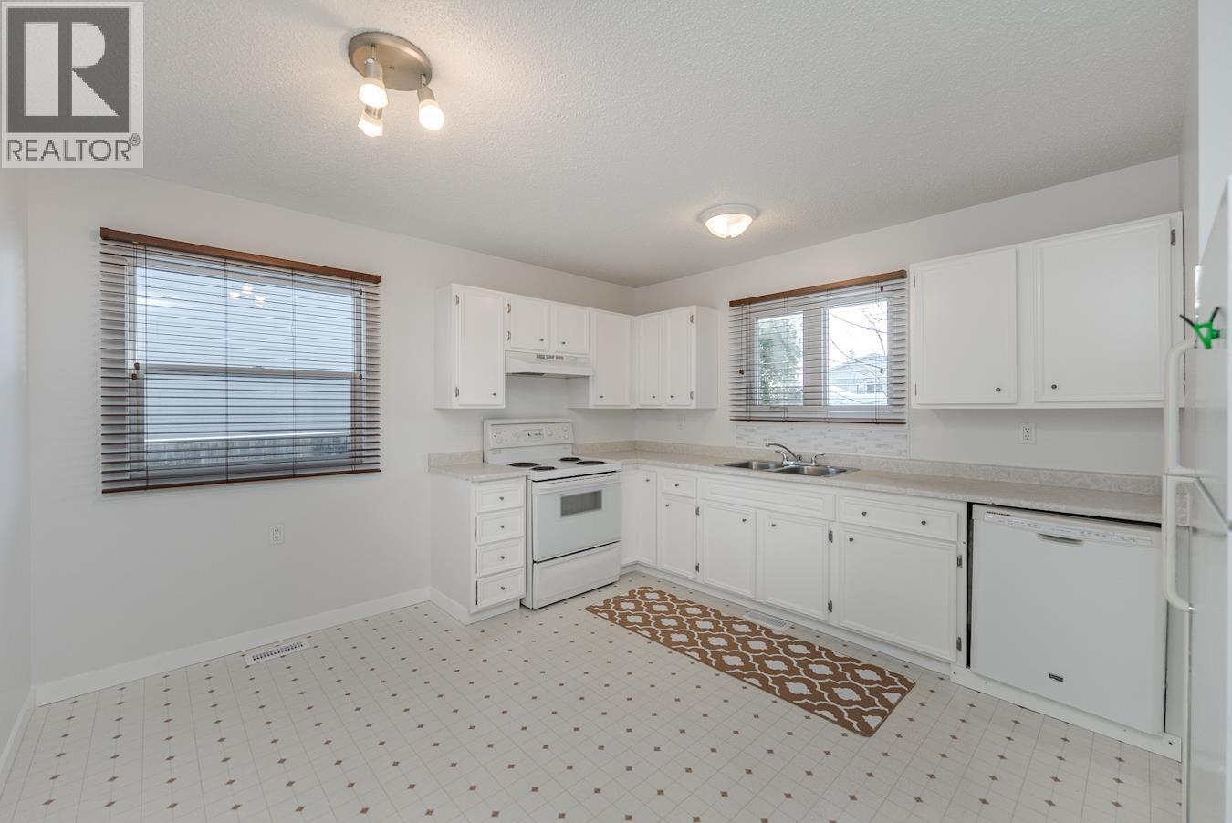 479 Dornbierer Crescent, Prince George, BC - Indoor Photo Showing Kitchen With Double Sink