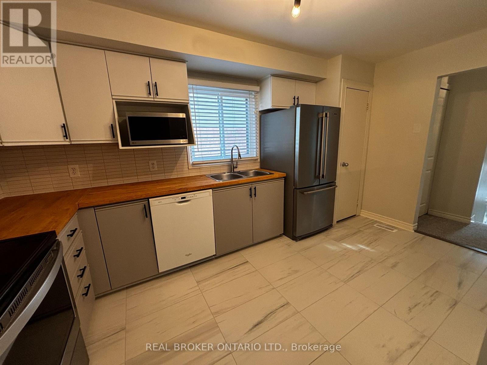 Upper - 102 Bonaventure Drive, London East, ON - Indoor Photo Showing Kitchen With Double Sink