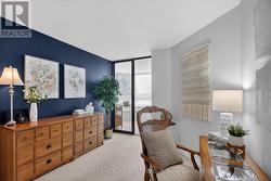 Den-ready second bedroom with access to solarium -