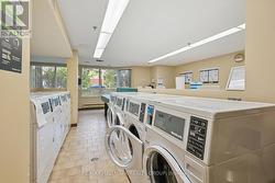 Main Floor Laundry Room, clean + lots machines -