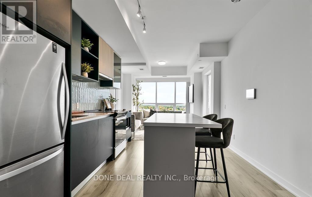 722 - 405 Dundas Street W, Oakville, ON - Indoor Photo Showing Kitchen With Upgraded Kitchen