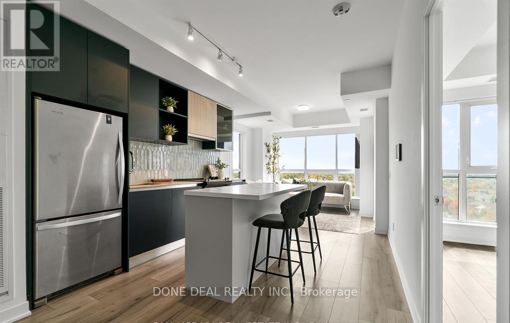 722 - 405 Dundas Street W, Oakville, ON - Indoor Photo Showing Kitchen With Upgraded Kitchen