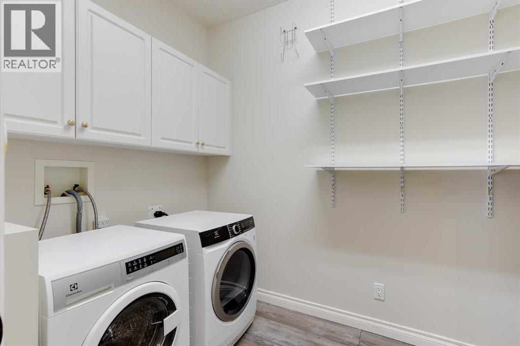 205, 59 22 Avenue Sw, Calgary, AB - Indoor Photo Showing Laundry Room