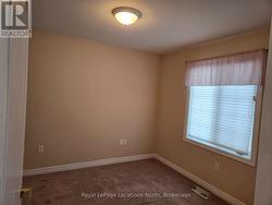 2nd bedroom with large window -