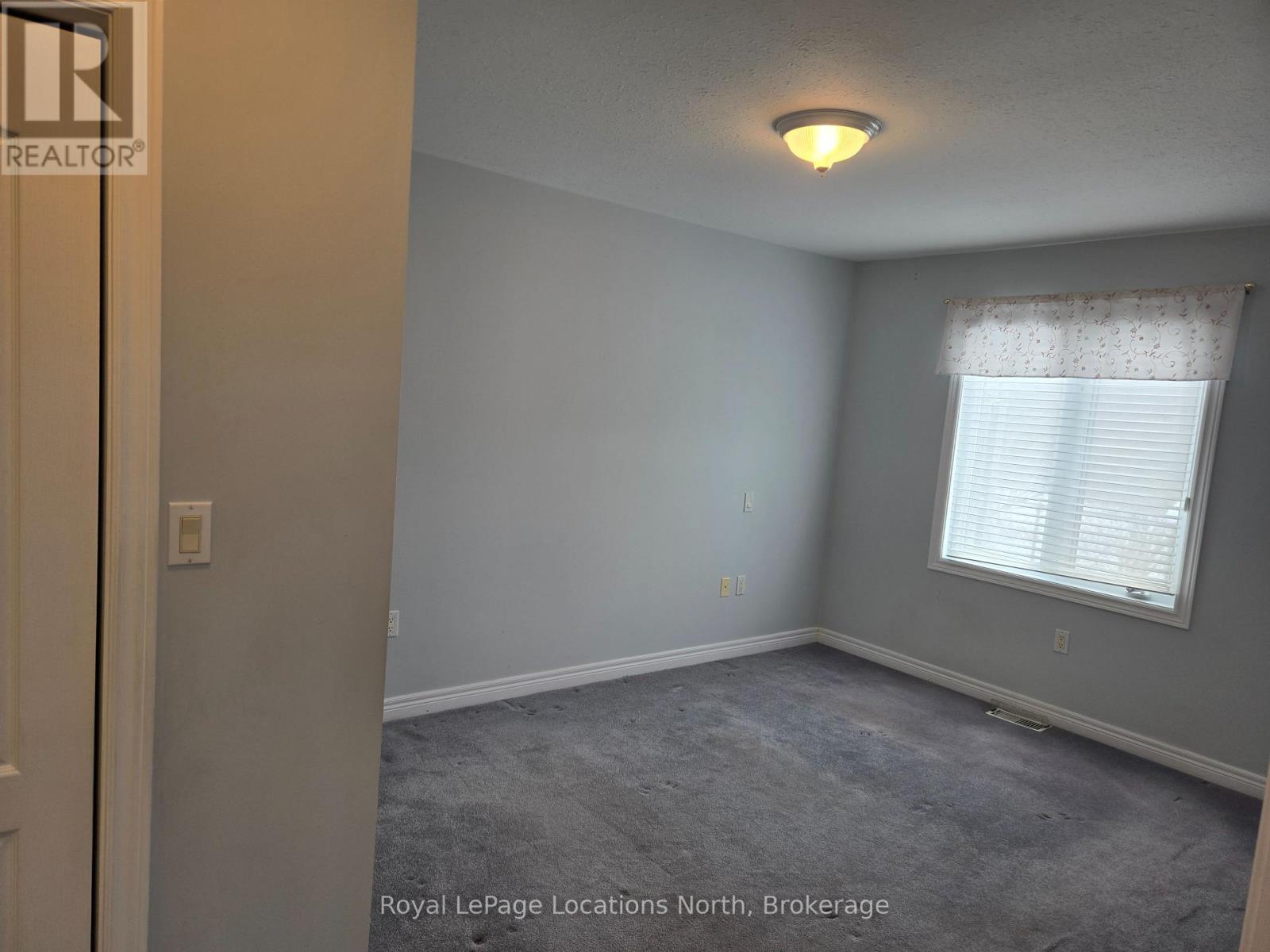 Large bright Primary bedroom - Unit # 23 - 275 Huron Street, Clearview (Stayner), ON - Indoor Photo Showing Other Room