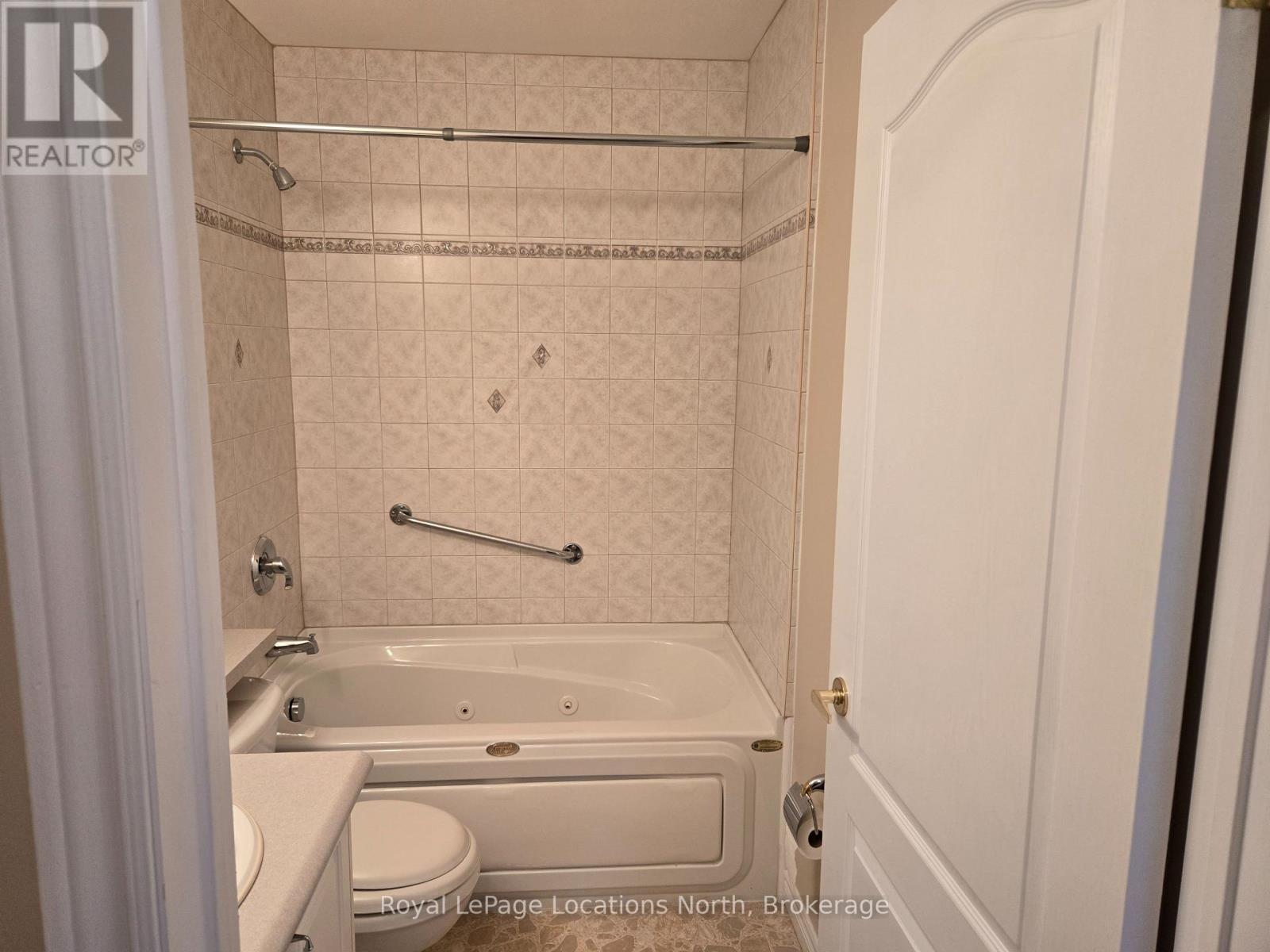 4 piece bathroom with jacuzzi tub - Unit # 23 - 275 Huron Street, Clearview (Stayner), ON - Indoor Photo Showing Bathroom