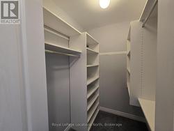 Large walk-in closet in primary bedroom -