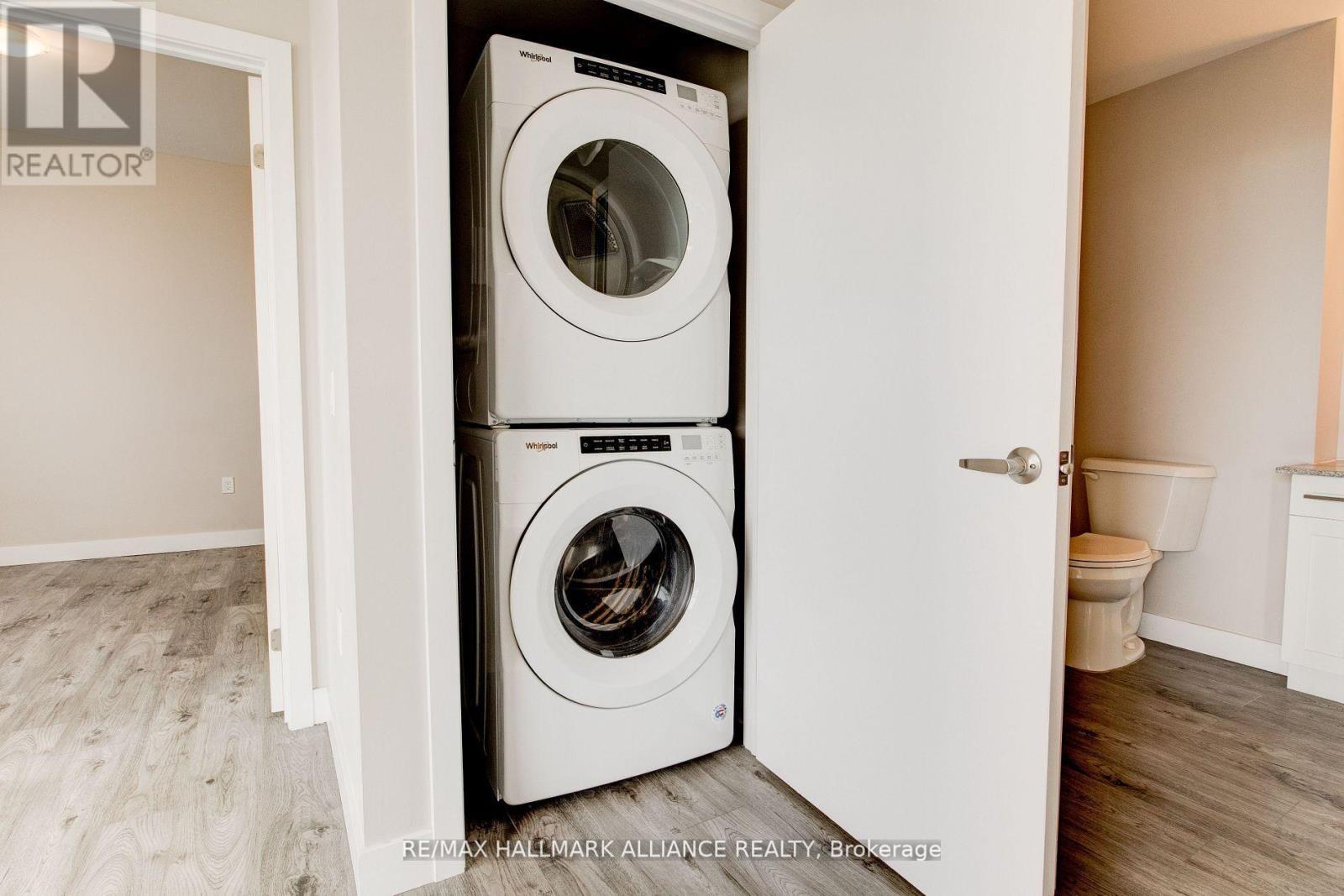 1508 - 100 Garment Street, Kitchener, ON - Indoor Photo Showing Laundry Room