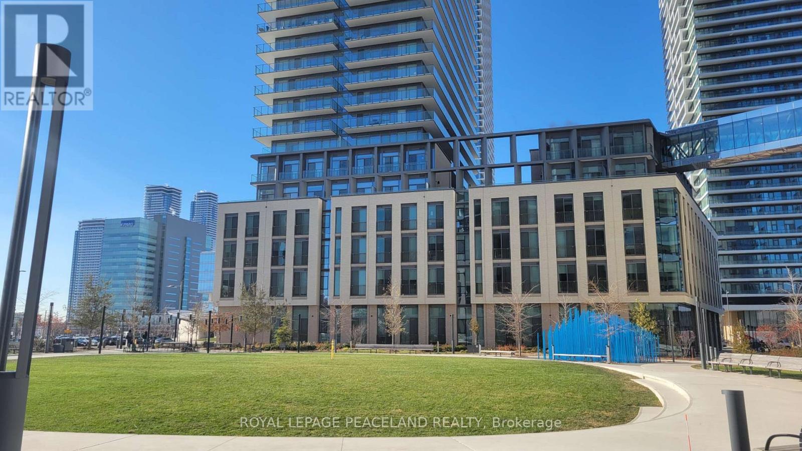 101 - 7890 Jane Street, Vaughan, ON - Outdoor With Facade