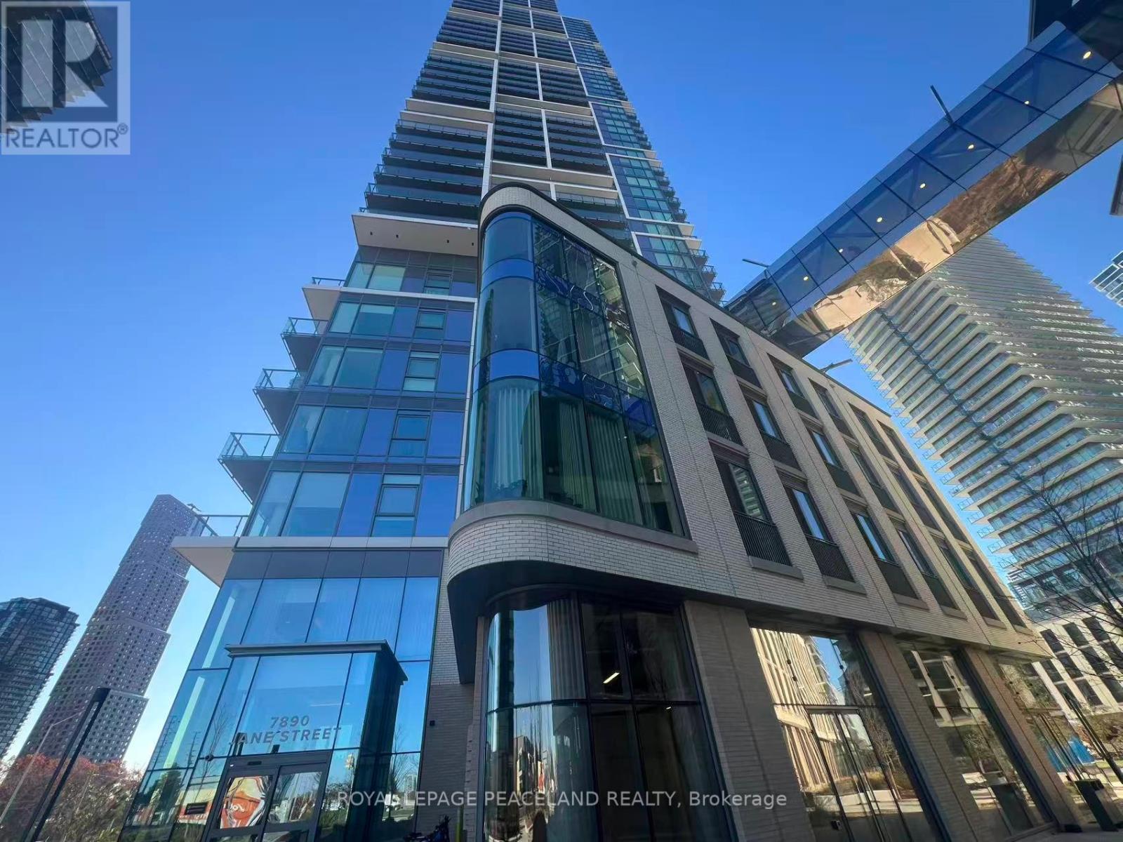 101 - 7890 Jane Street, Vaughan, ON - Outdoor With Facade