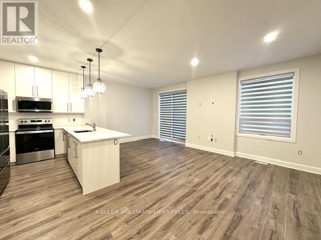 233 - 175 Doan Drive, Middlesex Centre, ON - Indoor Photo Showing Kitchen