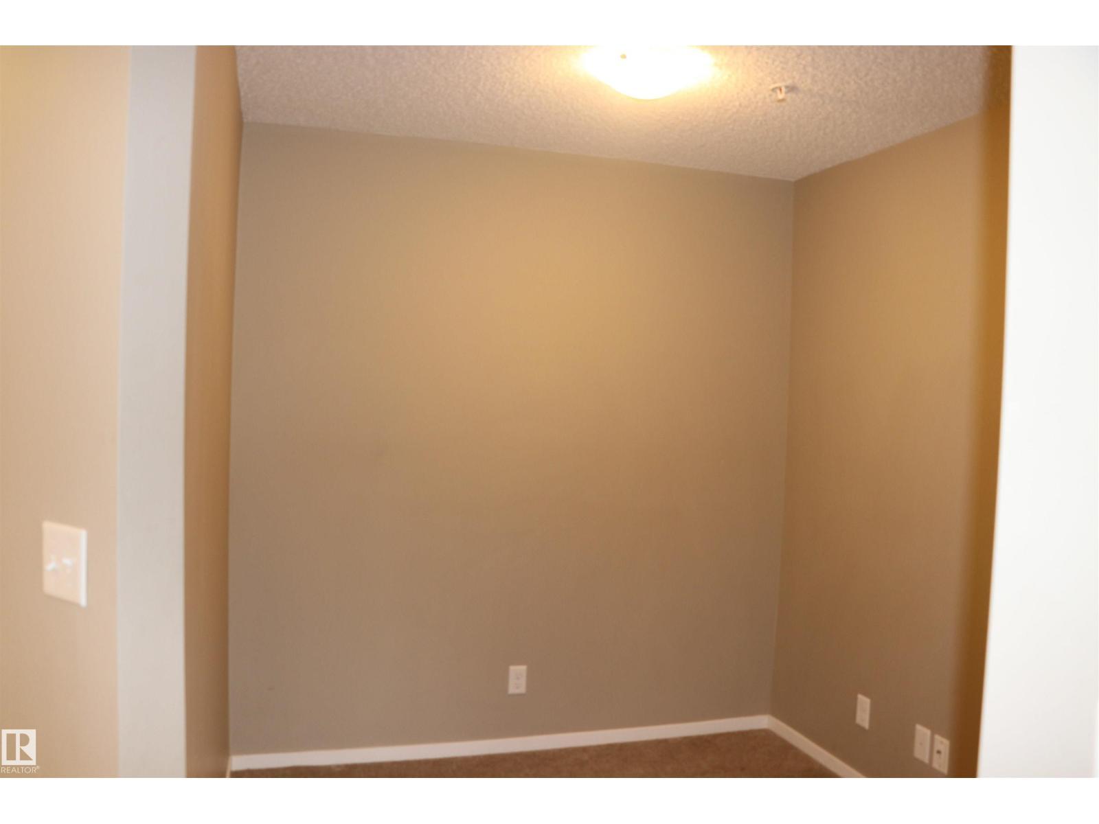 #312 3207 James Mowatt Trail Sw, Edmonton, AB - Indoor Photo Showing Other Room