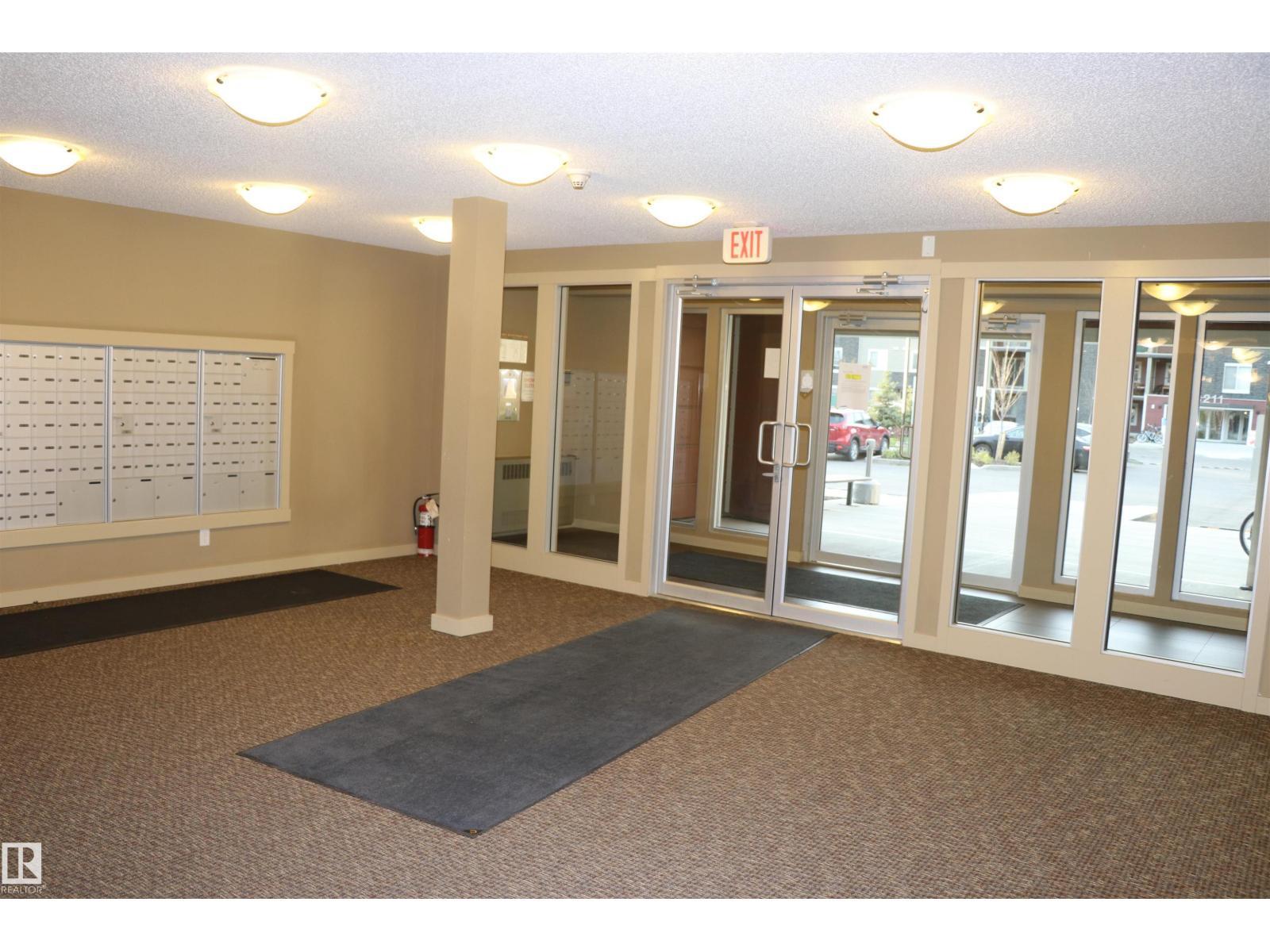 #312 3207 James Mowatt Trail Sw, Edmonton, AB - Indoor Photo Showing Other Room