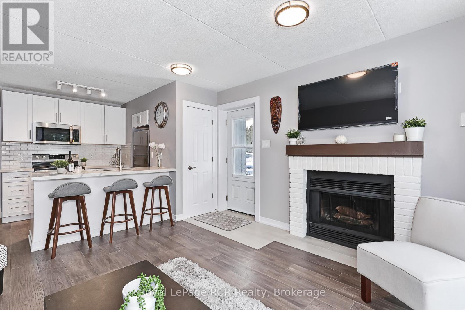 80 - 21 Dawson Drive, Collingwood, ON - Indoor With Fireplace