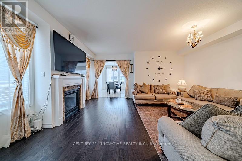 3 Whitefish Street, Whitby, ON - Indoor Photo Showing Living Room With Fireplace