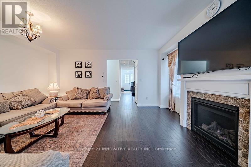 3 Whitefish Street, Whitby, ON - Indoor Photo Showing Living Room With Fireplace