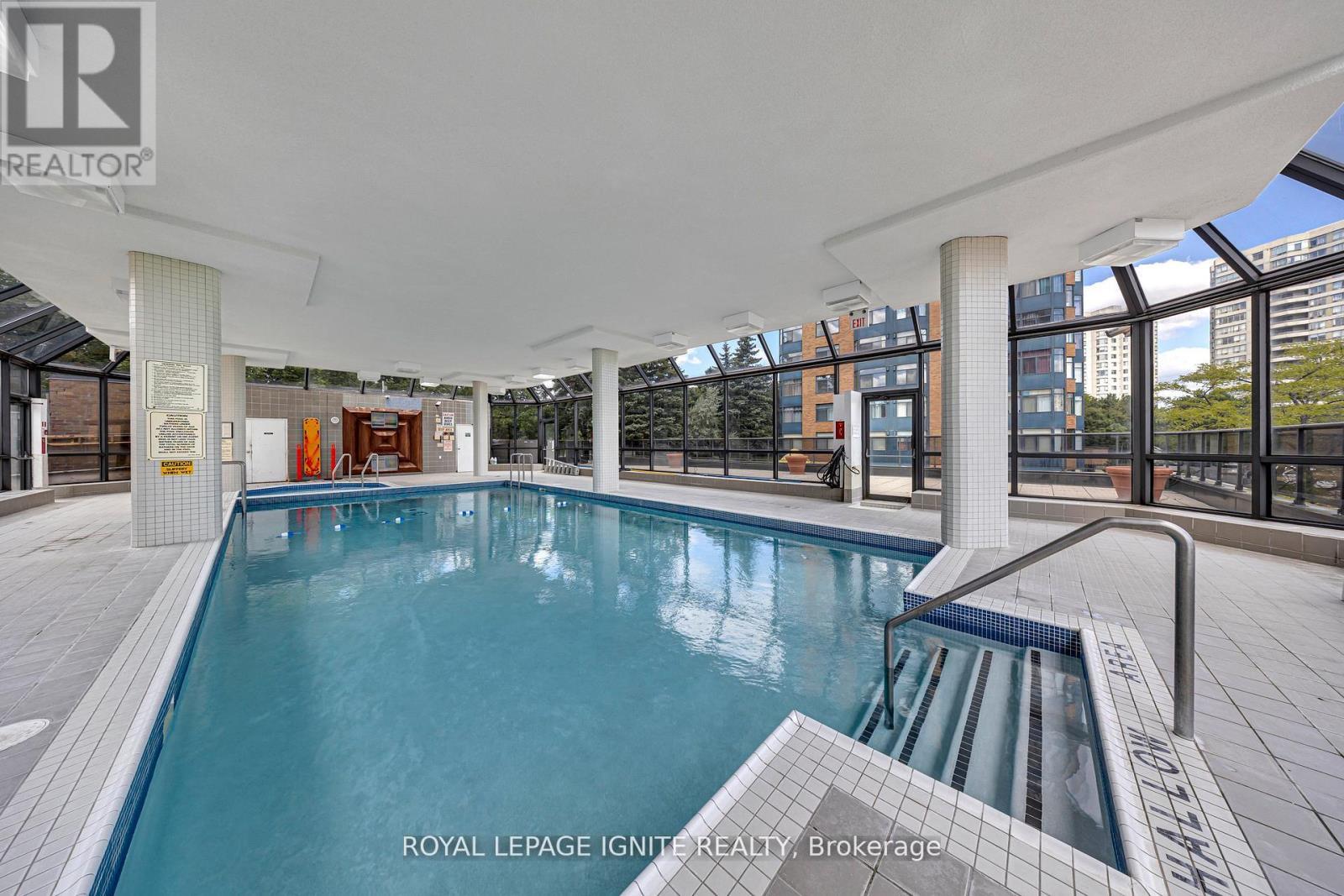 215 - 88 Alton Towers Circle, Toronto, ON - Photo Showing Other Room With In Ground Pool