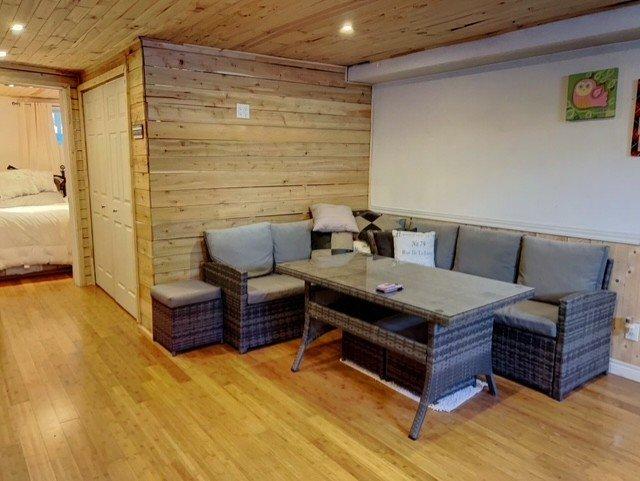 Salle familiale - 27 Ch. Haley, Matapédia, QC - Indoor Photo Showing Other Room With Fireplace