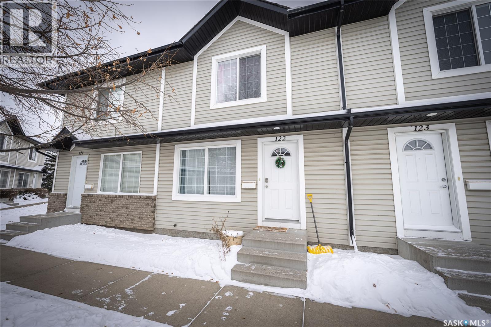122 103 Rutherford Crescent, Saskatoon, SK - Outdoor With Facade