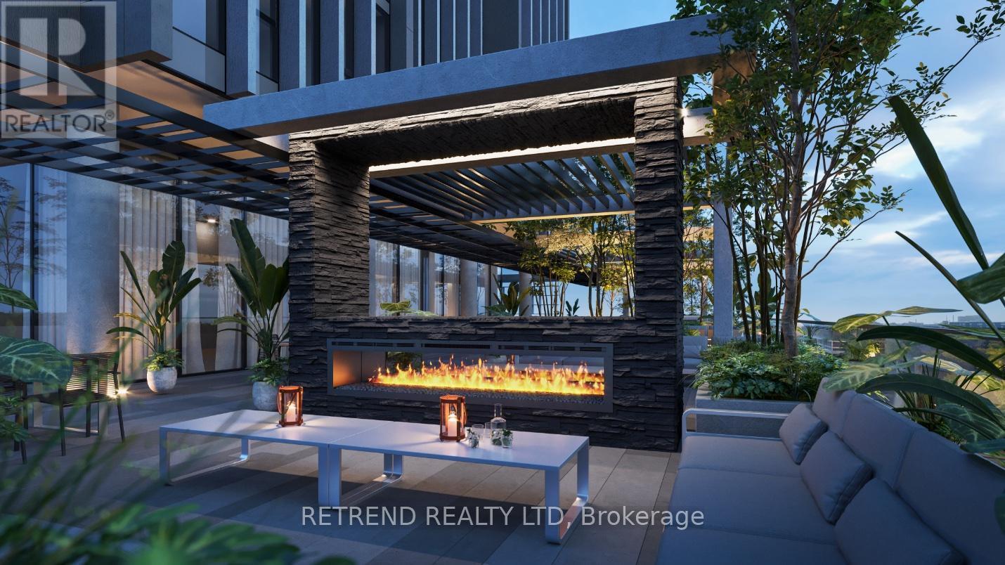 1914 - 1 Quarrington Lane, Toronto, ON - Outdoor With Fireplace