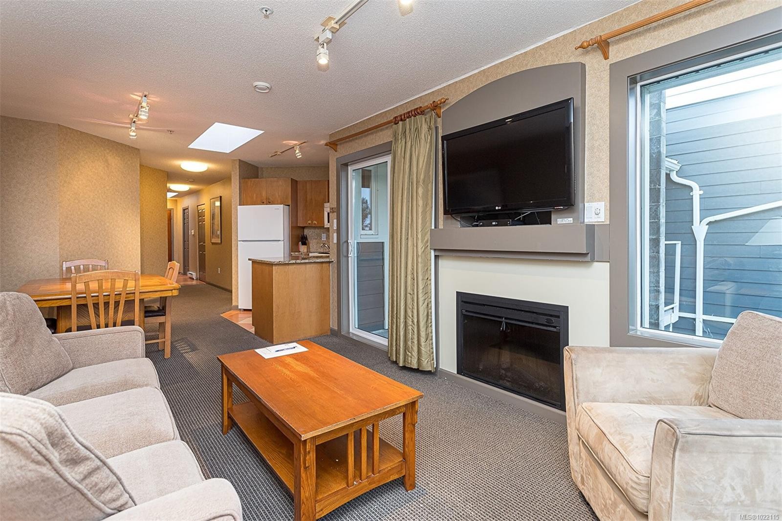 734-1600 Stroulger Rd, Nanoose Bay, BC - Indoor Photo Showing Living Room With Fireplace