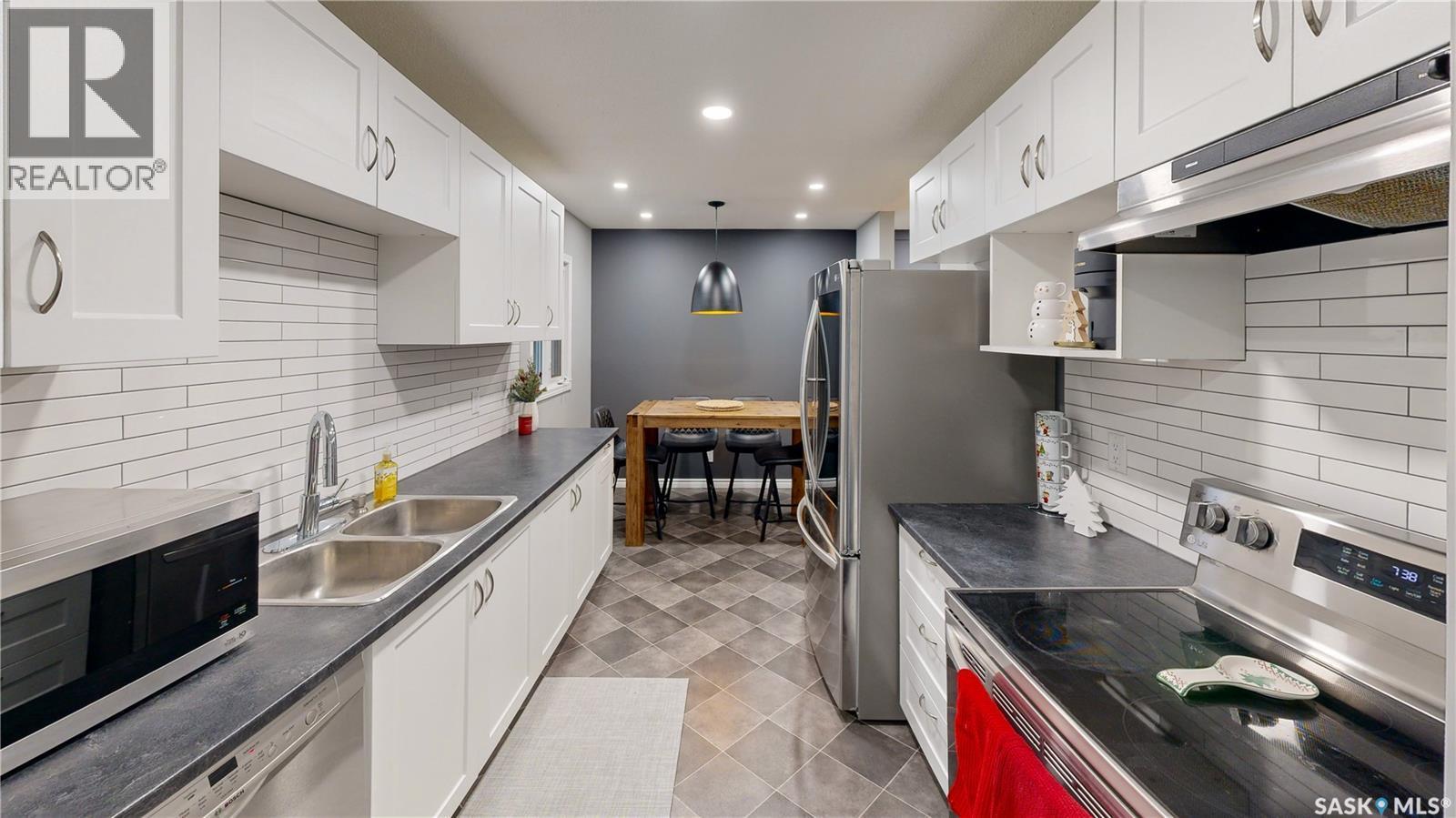 1714 7Th Avenue E, Regina, SK - Indoor Photo Showing Kitchen With Double Sink