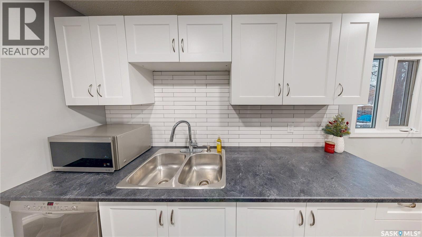 1714 7Th Avenue E, Regina, SK - Indoor Photo Showing Kitchen With Double Sink