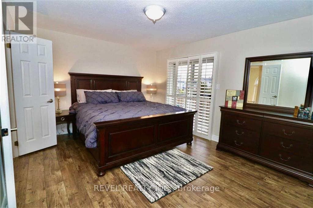 Primary Bedroom - 412 Olde Village Lane, Shelburne, ON - Indoor Photo Showing Bedroom