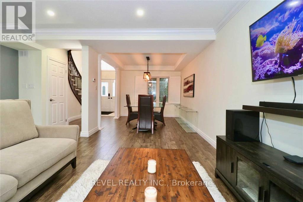 Open Concept Living/Dining - 412 Olde Village Lane, Shelburne, ON - Indoor Photo Showing Living Room