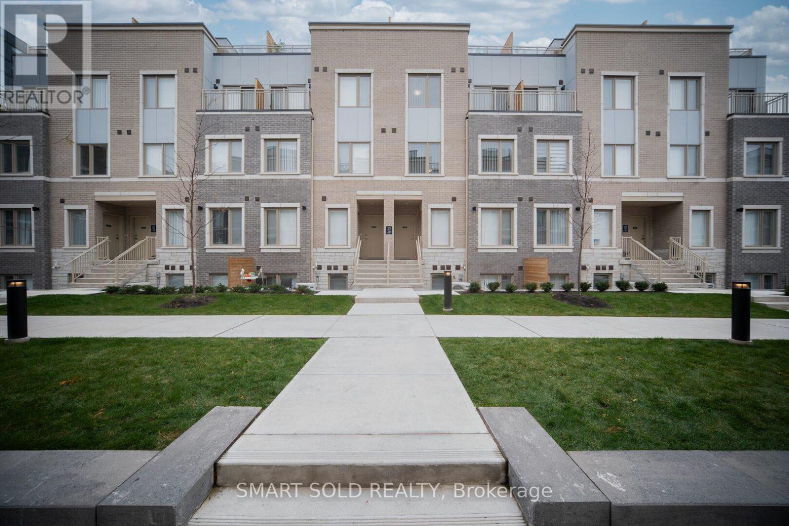 239 - 121 Honeycrisp Crescent, Vaughan, ON - Outdoor With Facade