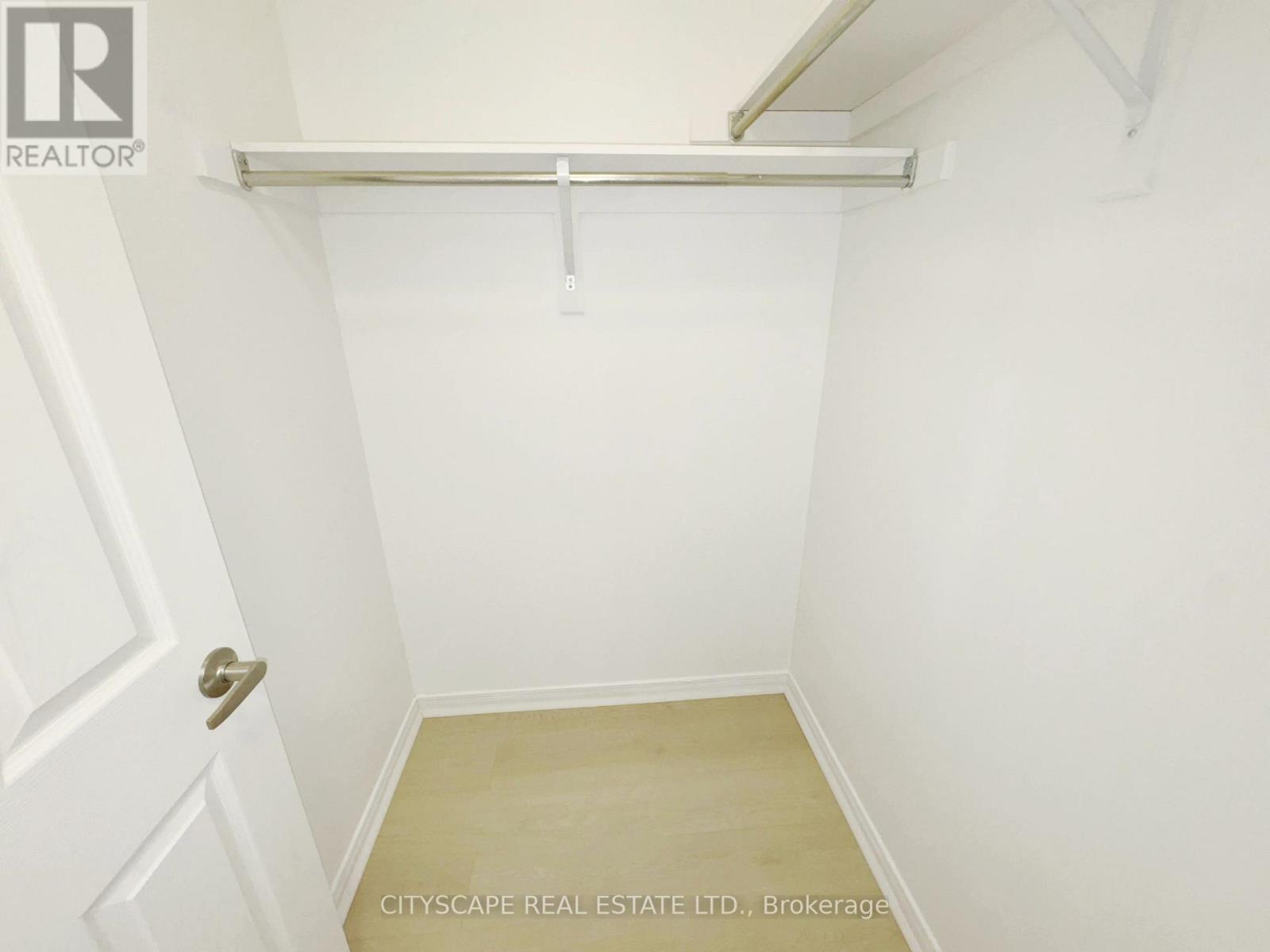 Primary Bedroom - Walk-ion Closet #1 - 64 Honeyview Trail, Brampton, ON - Indoor With Storage