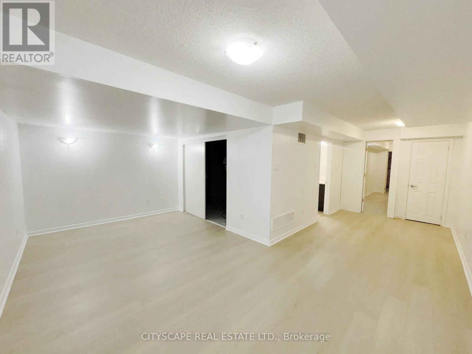 Basement - L-Shaped Rec Room - 64 Honeyview Trail, Brampton, ON - Indoor Photo Showing Other Room