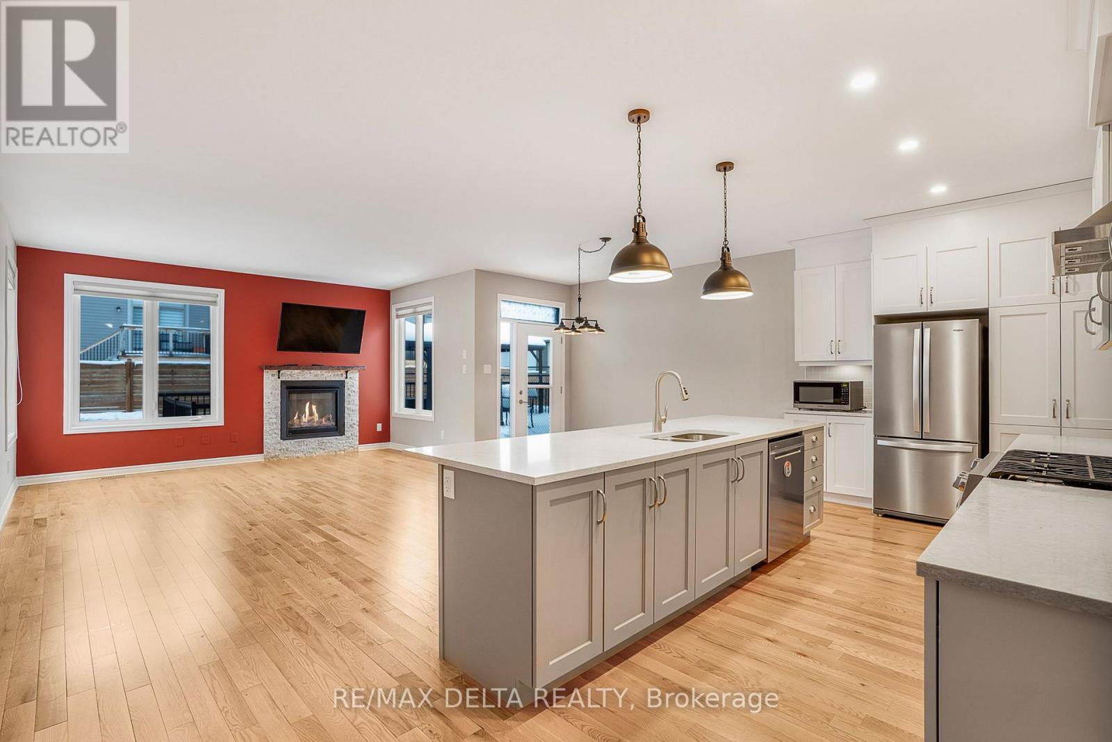 258 De L'Étang Street, Clarence-Rockland, ON - Indoor Photo Showing Kitchen With Fireplace With Upgraded Kitchen