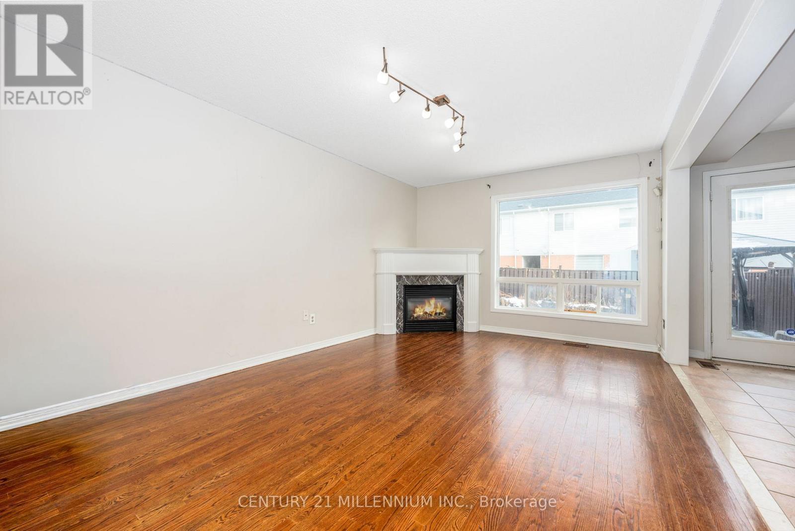 15 Tundra Swan Road, Brampton, ON - Indoor Photo Showing Living Room With Fireplace