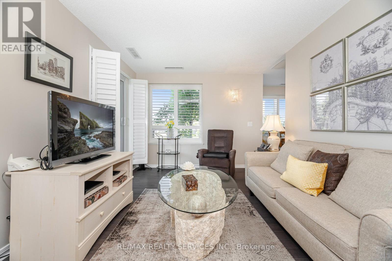 105 - 60 Via Rosedale Way, Brampton, ON - Indoor Photo Showing Living Room