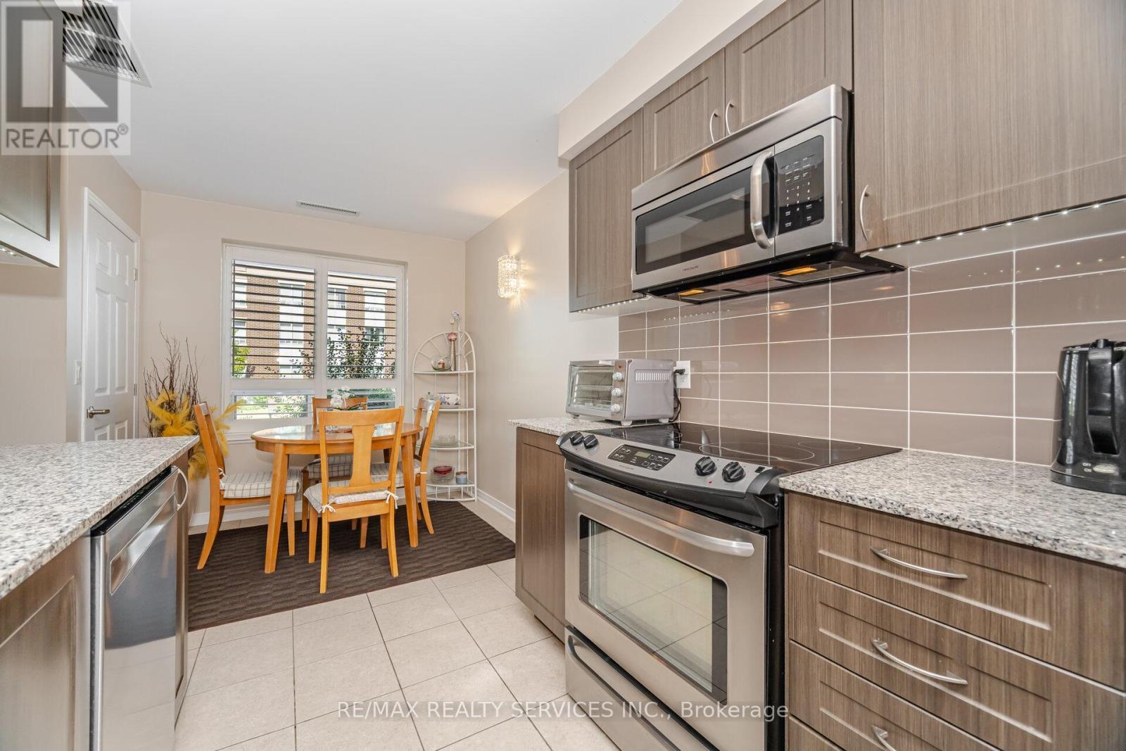 105 - 60 Via Rosedale Way, Brampton, ON - Indoor Photo Showing Kitchen