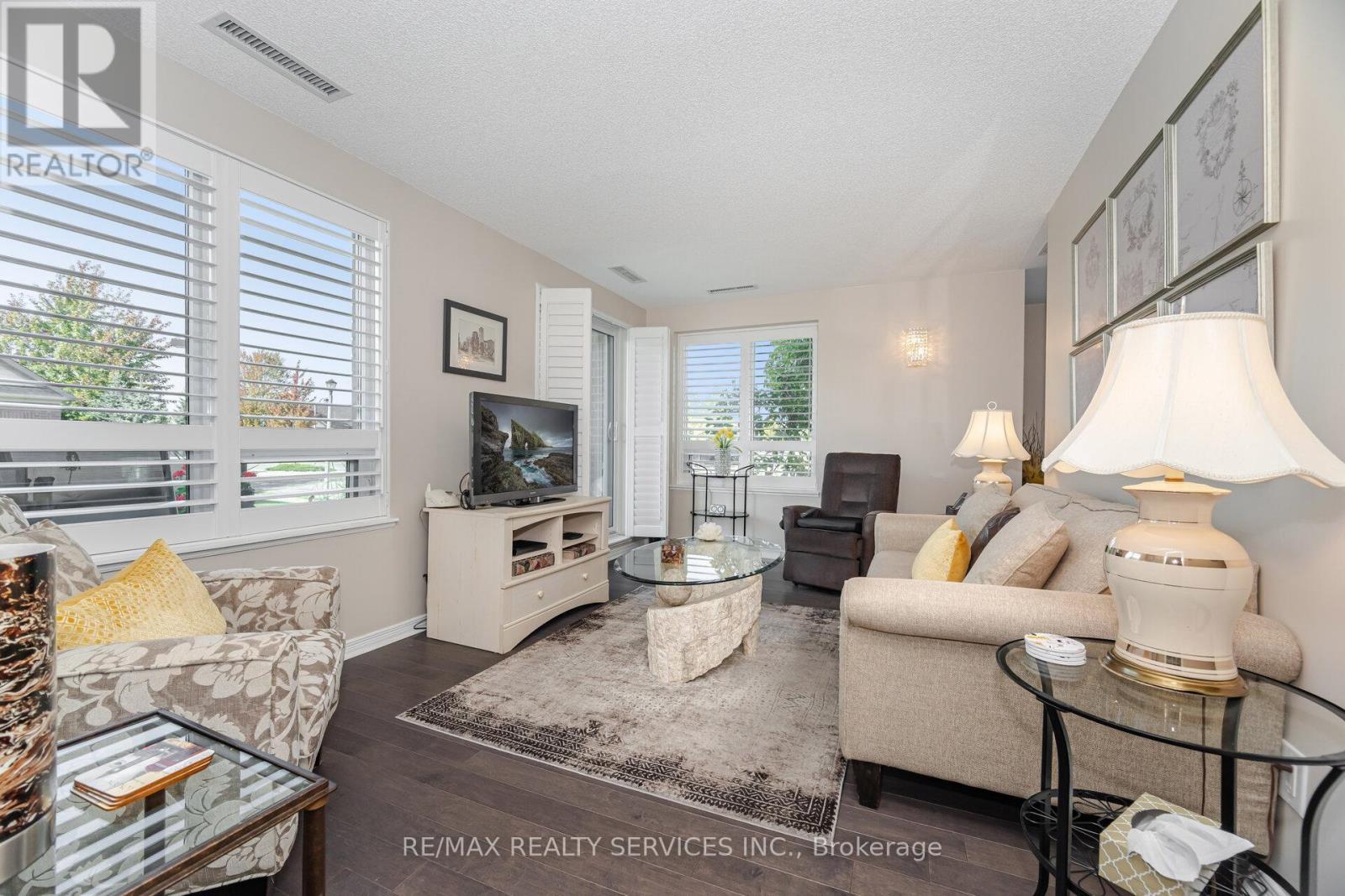 105 - 60 Via Rosedale Way, Brampton, ON - Indoor Photo Showing Living Room