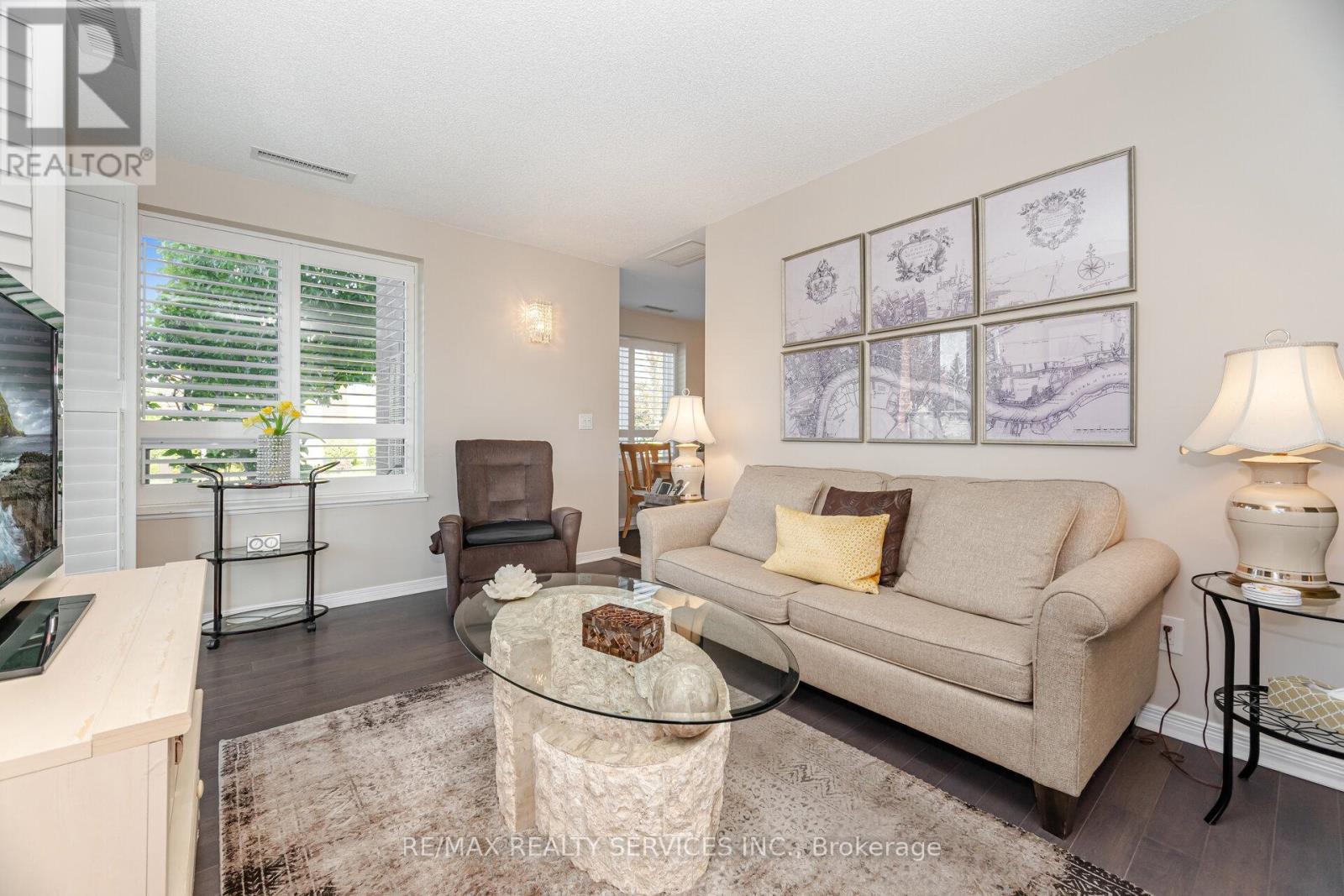 105 - 60 Via Rosedale Way, Brampton, ON - Indoor Photo Showing Living Room