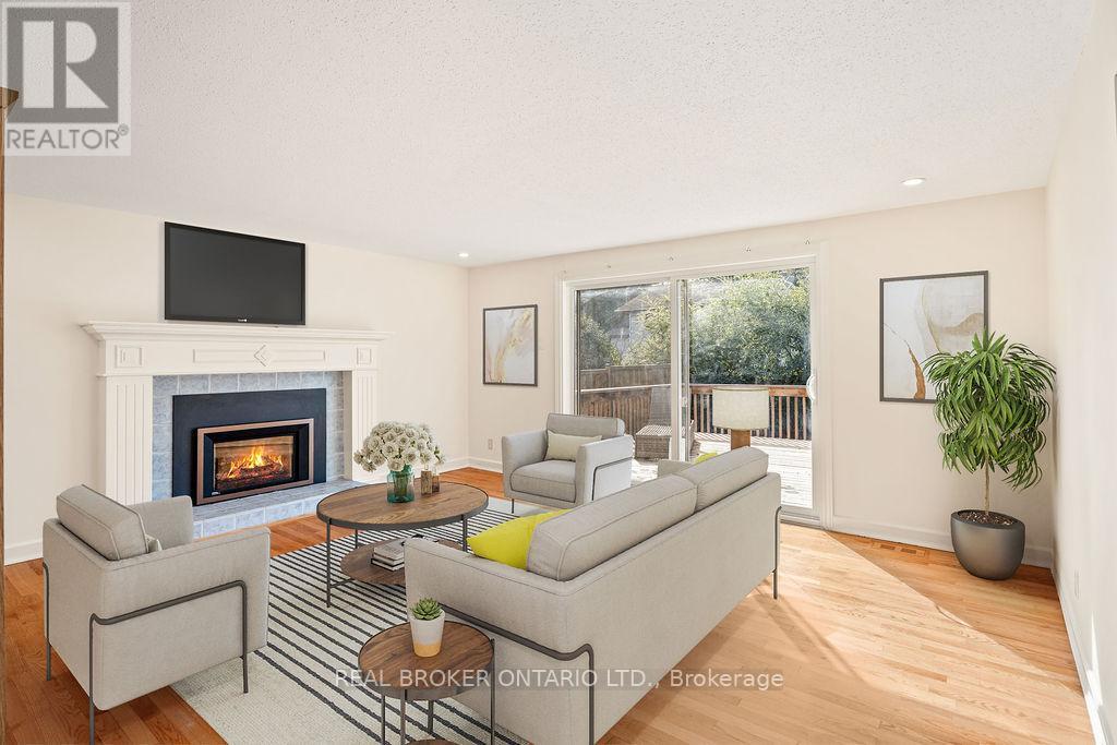 Family Room with Gas Fireplace - 99 Queensline Drive, Ottawa, ON - Indoor Photo Showing Living Room With Fireplace