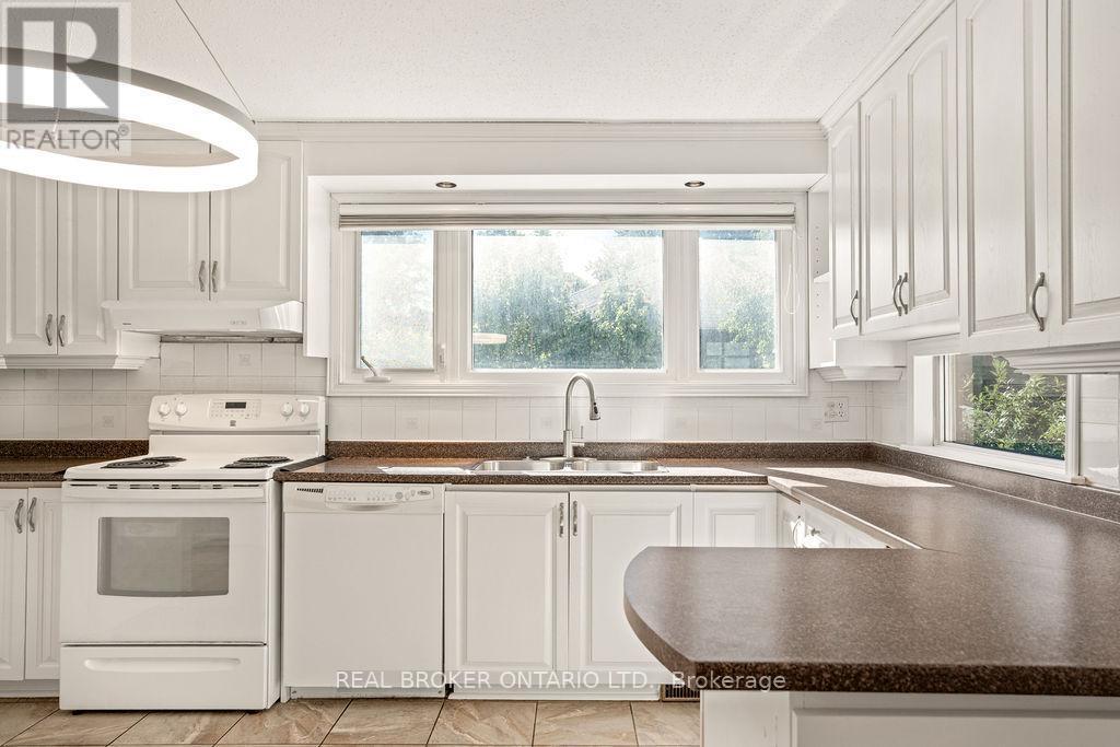 South Facing Sink and Large Windows - 99 Queensline Drive, Ottawa, ON - Indoor Photo Showing Kitchen With Double Sink