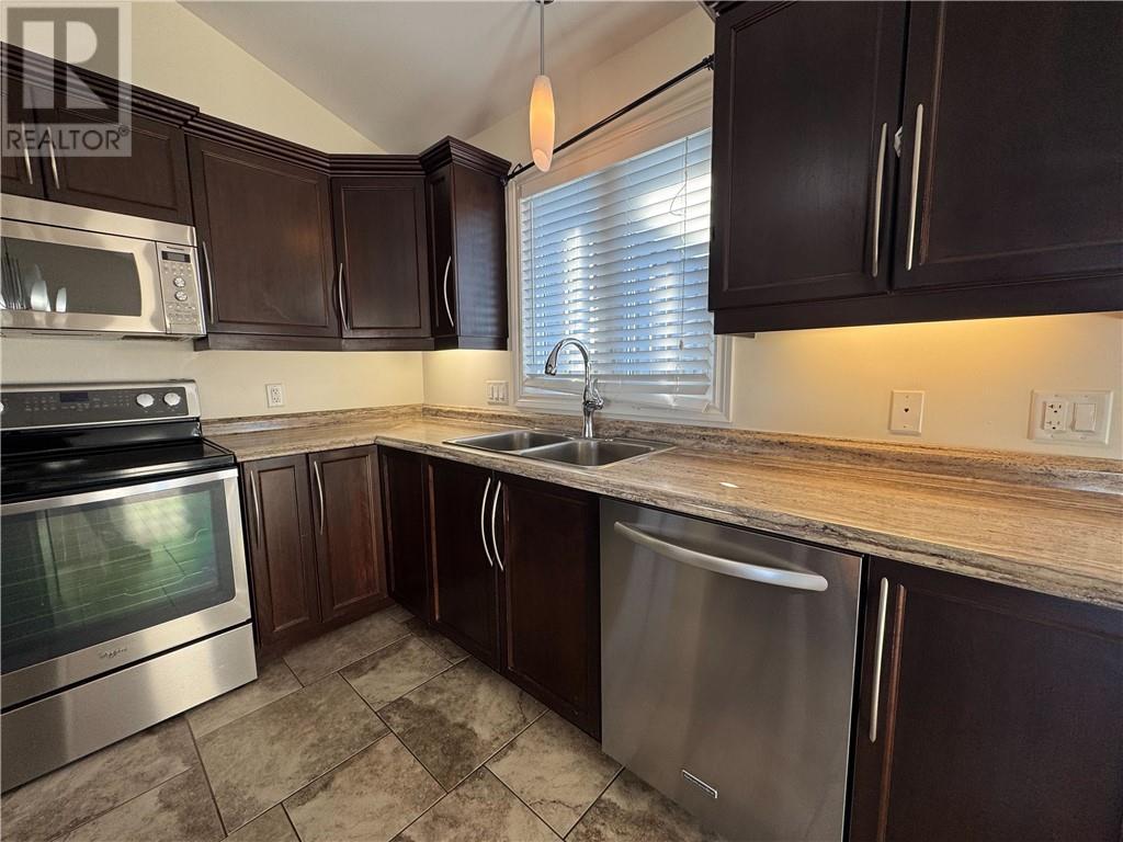 4623 Country Club Drive Unit# Upper, Azilda, ON - Indoor Photo Showing Kitchen With Stainless Steel Kitchen With Double Sink