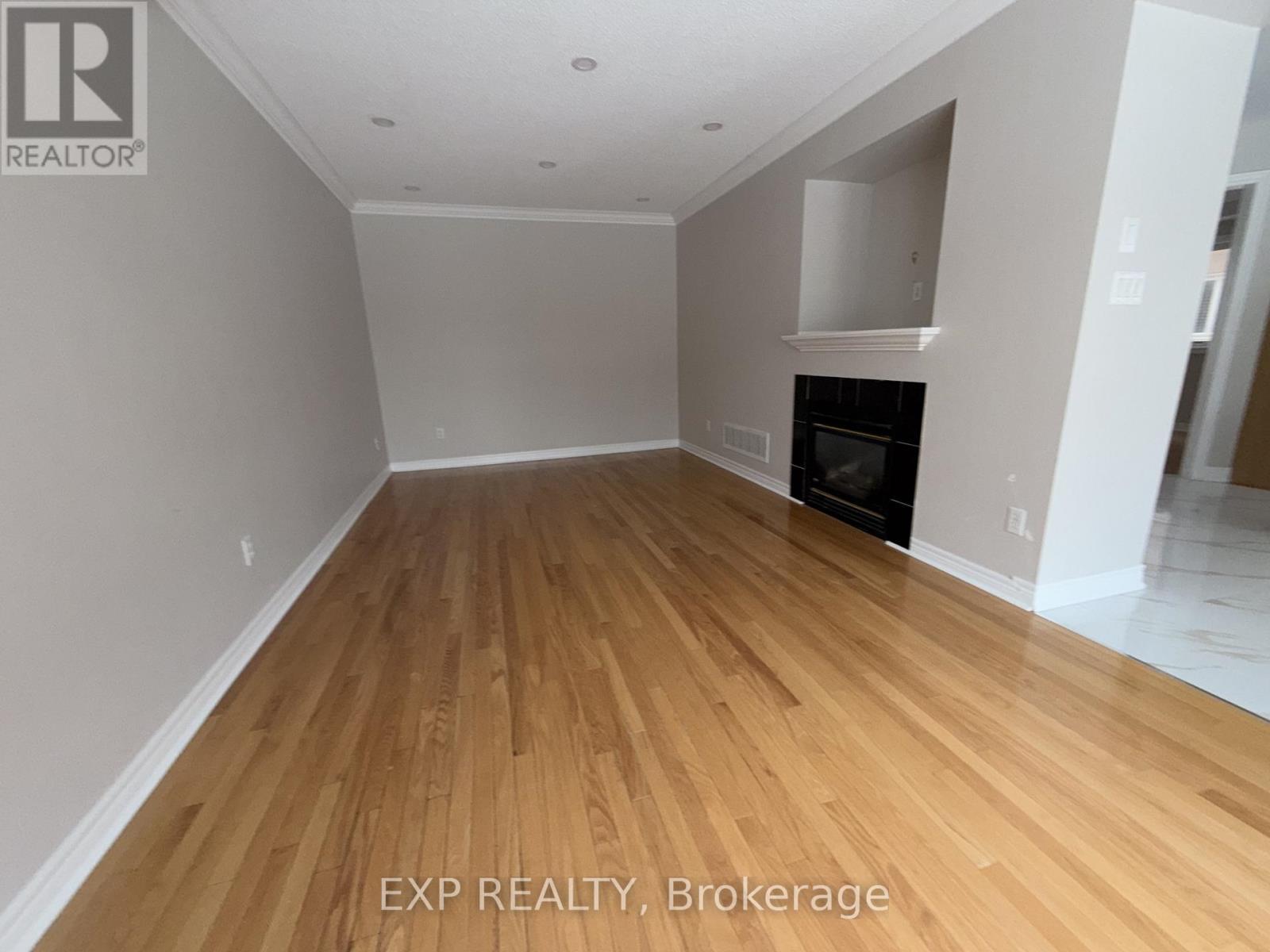 18 Highwood Road, Brampton, ON - Indoor Photo Showing Other Room With Fireplace