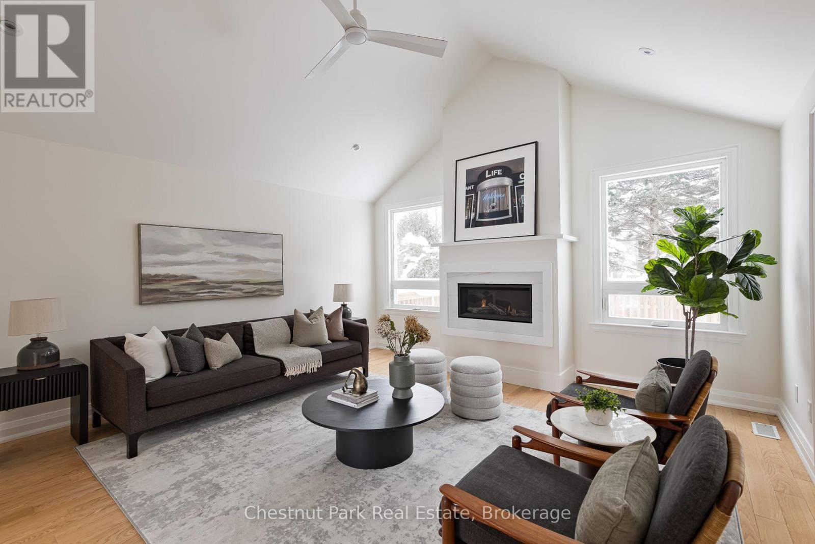 4 Wickens Lane, Blue Mountains, ON - Indoor Photo Showing Living Room With Fireplace
