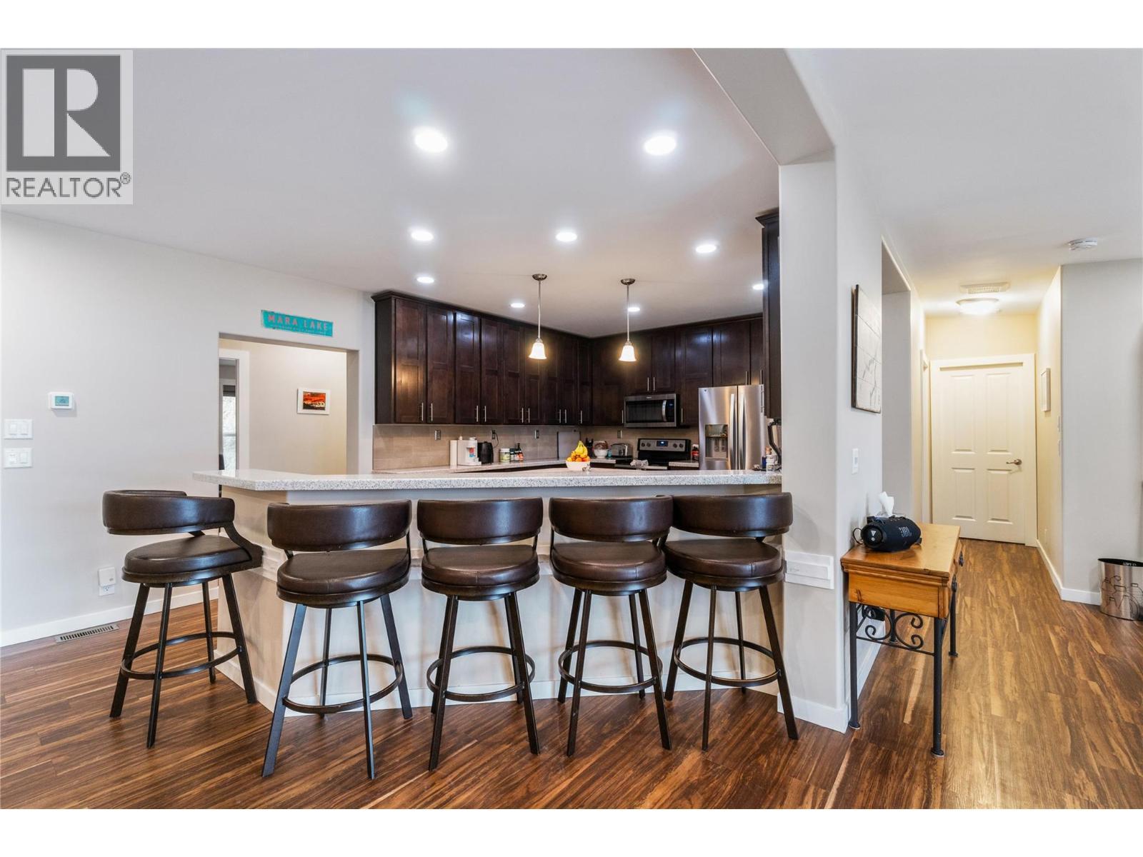 bar seating in kitchen - 405 97A Highway, Sicamous, BC