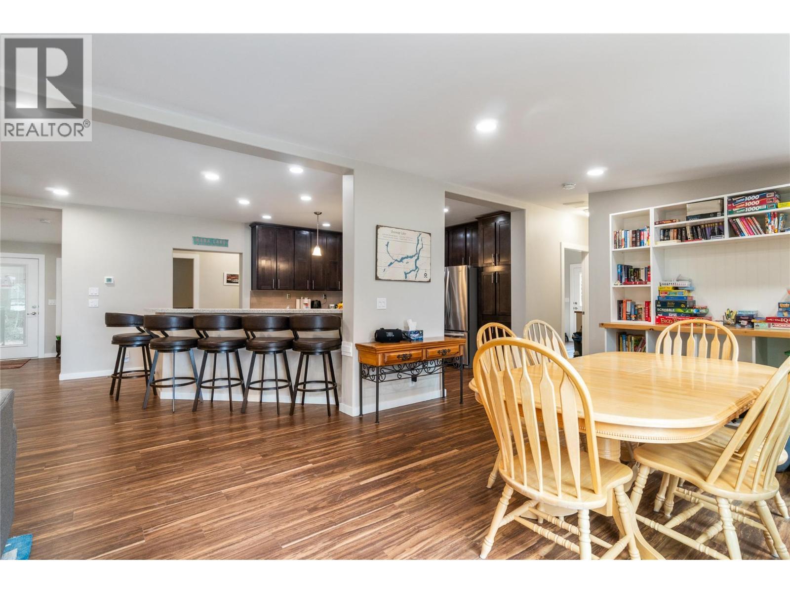 dining room / bar seating at kitchen - 405 97A Highway, Sicamous, BC